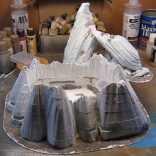 Covered in gesso and texture on the base.